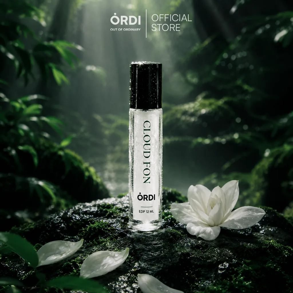 CLOUD FON 12ml roll-on beside a white magnolia